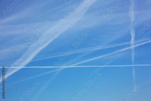 Cloudscape with air trails photo