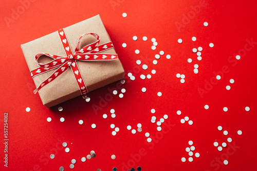 gift box on valentines day on red background.
