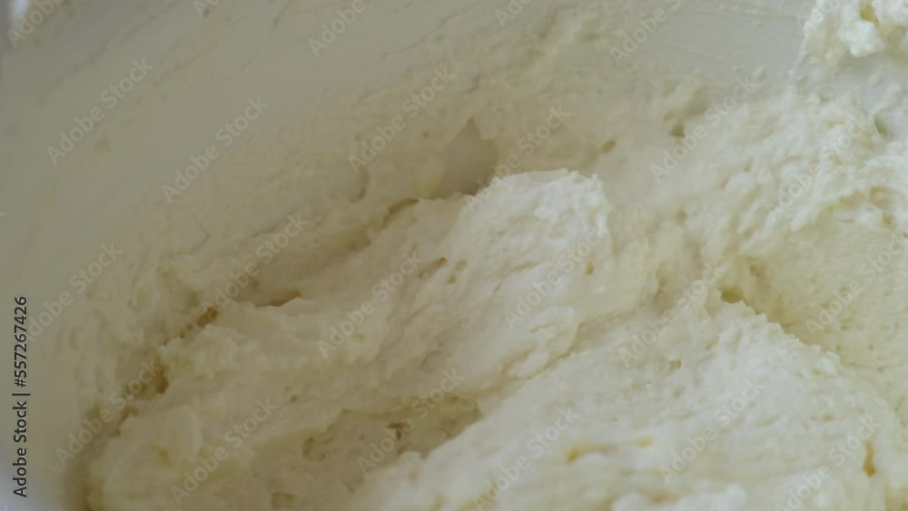 the process of cooking tiramisu. cook dials mascarpone with a spoon. cook dials homemade mascarpone with a spoon the process of cooking tiramisu. cook dials mascarpone with a spoon. cook dials homemade mascarpone with a spoon
