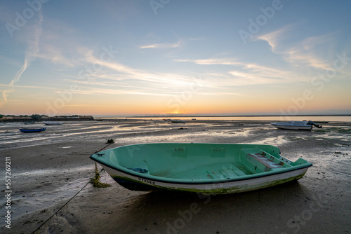 Fisherboat on the shore during sunrise in Olhao  Portugal