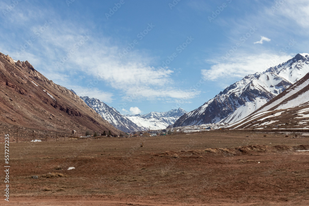 landscape with sky and montains covered with snow