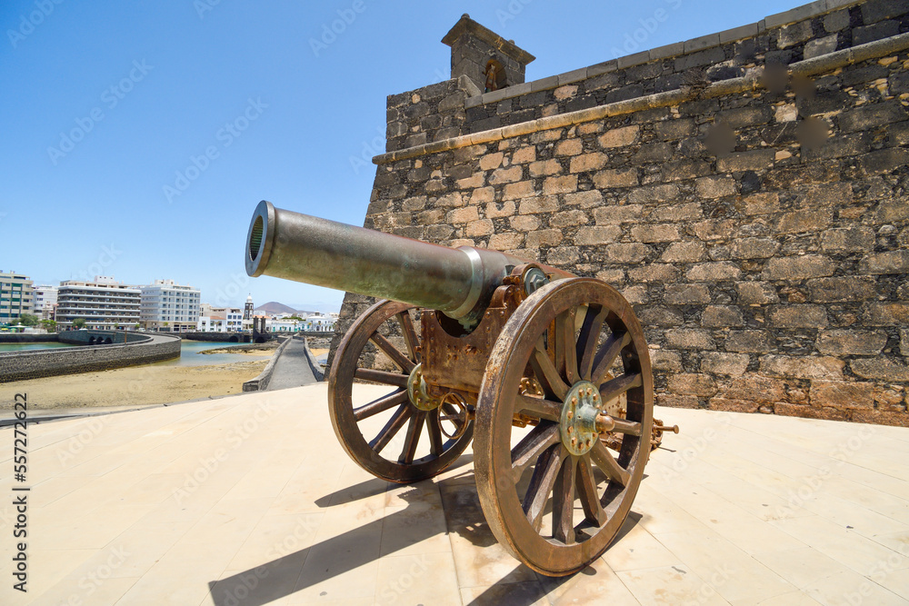 Old cannon of the Castillo de San Gabriel in Arrecife pointing towards the bay Old cannon of the Castillo de San Gabriel in Arrecife pointing towards the bay