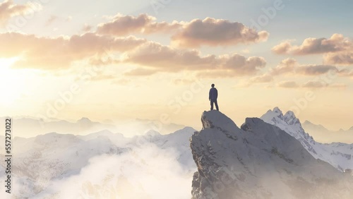 Adventurous Man Hiker standing on top of icy peak with rocky mountain in background. Adventure Composite. 3d Rendering rocks. Aerial Image of landscape from BC, Canada. Sunset Sky. Cinematic Animation photo