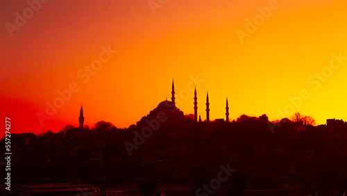 The historical Süleymaniye Mosque, built in the name of Suleiman the Magnificent in Istanbul, silhouette, sunset, space and writing area