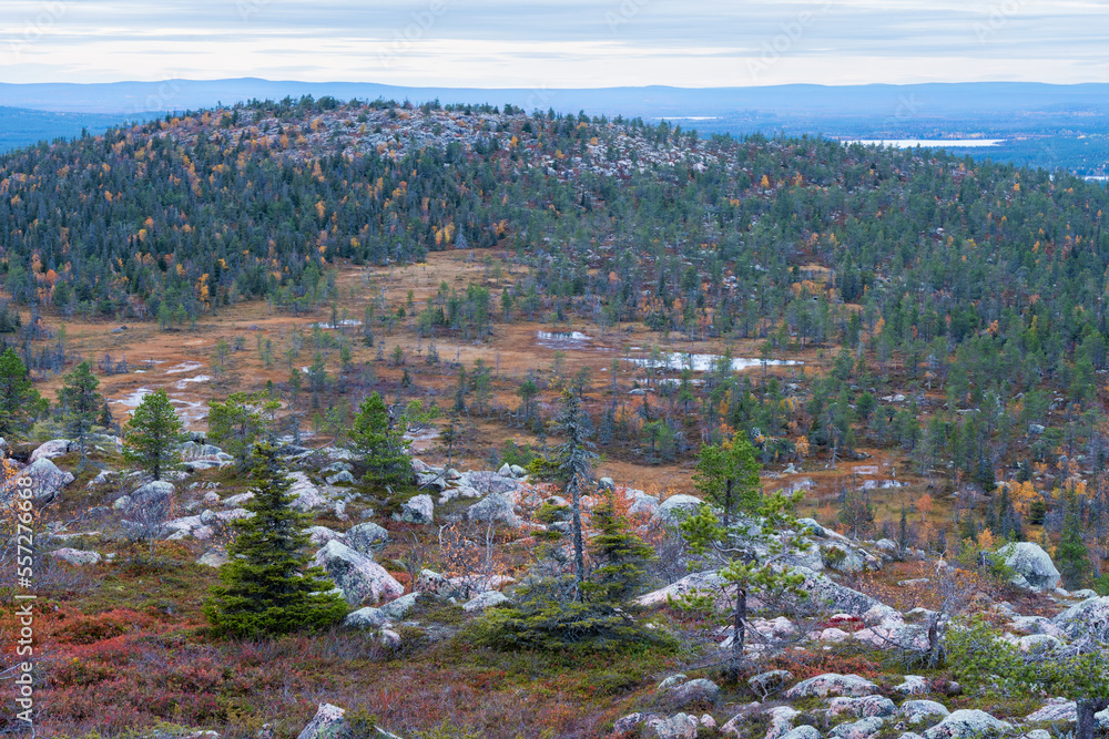 A view from a rocky Iso Ruuhitunturi peak on a gloomy autumn evening in Salla National Park, Northern Finland	