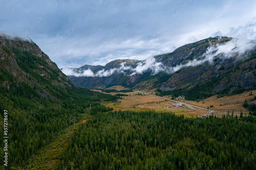 Aerial landscape Altai melancholic mood, blue geyser lake with forest Aktash mountains, Altay Russia drone view Aerial landscape Altai melancholic mood, blue geyser lake with forest Aktash mountains, Altay Russia drone view