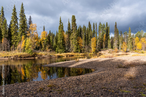 A sandy bank of a river Oulanka (Oulankajoki) on an autumn day in Oulanka National Park, Northern Finland	