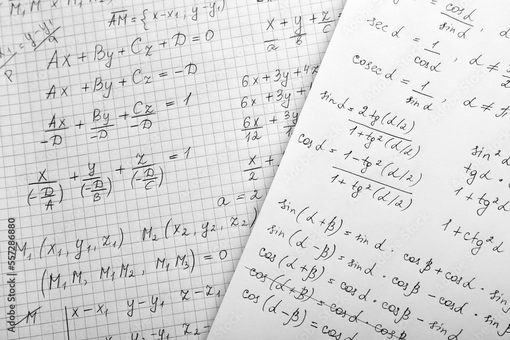 Sheets of paper with different mathematical formulas, top view Sheets of paper with different mathematical formulas, top view