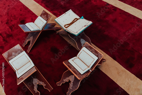 Photo of the holy Islamic book of the Qoran in a modern mosque photo
