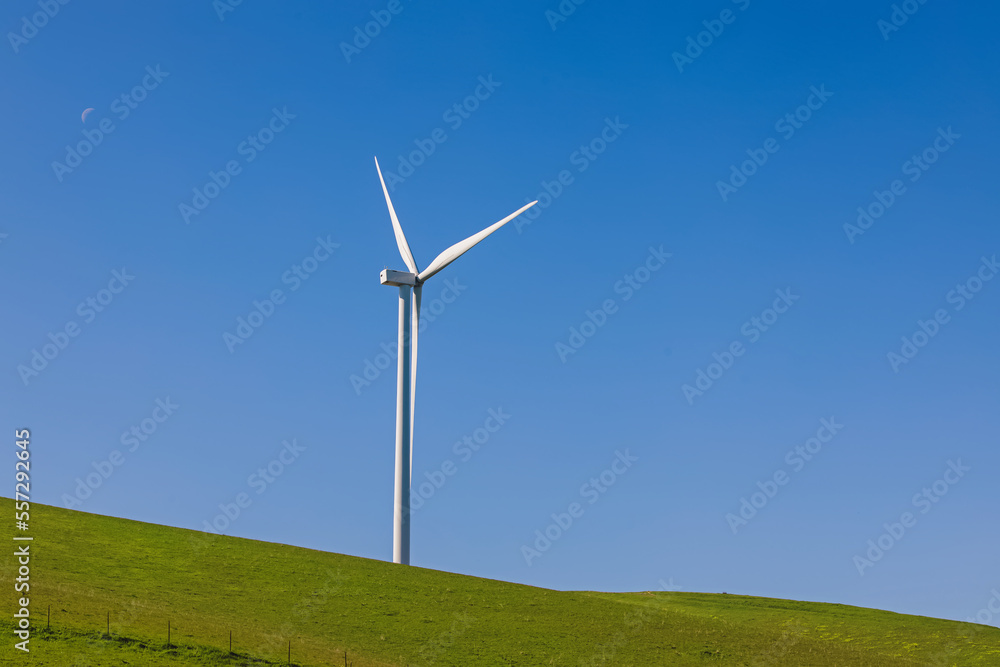 Wind turbine on the green meadow, renewable energy Wind turbine on the green meadow, renewable energy