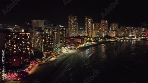 Wallpaper Mural waikiki drone aerial footage at night with bright buildings and lots of light with traffic and palm trees oahu hawaii Torontodigital.ca