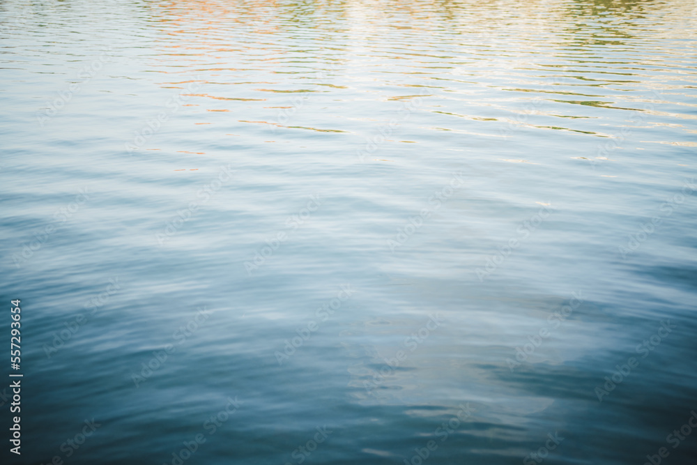 Shot of calm water surface of a river. Guadalquivir river in Seville, Spain.