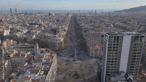 flying forward high over Paseo de Gracia in Barcelona Spain