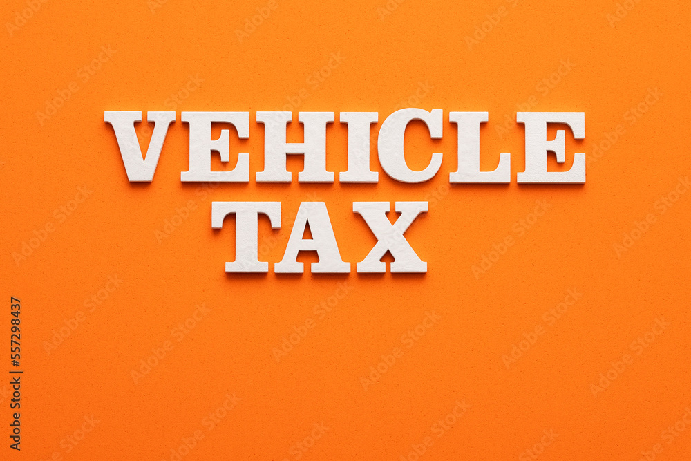 Car tax concept - title on orange background Car tax concept - title on orange background