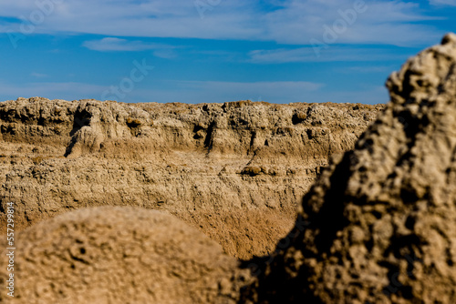 Dry Landscape of badlands National Park Along the Blue Sky