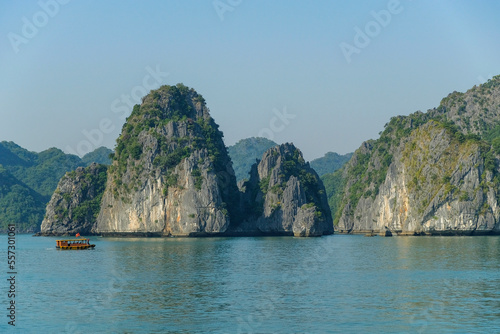 Cat Ba, Vietnam - December 21, 2022: A fishing boat in Lan Ha Bay in Cat Ba, Vietnam.