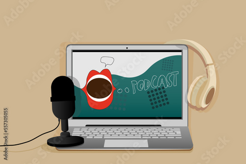Modern laptop with microphone and headphones on beige background. Concept of podcast