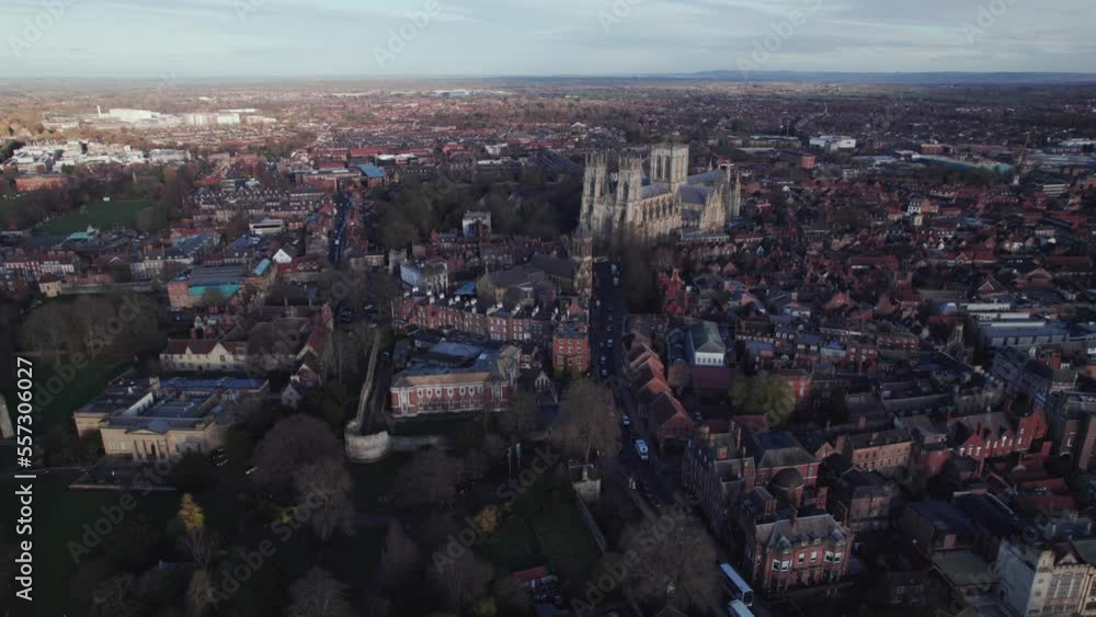 High drone shot flying backward over York showing York Minster, UK High drone shot flying backward over York showing York Minster, UK