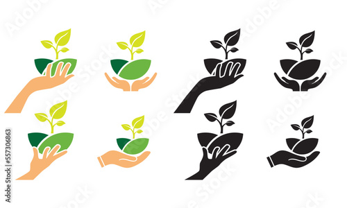 set of hands with plants eye catching icon.