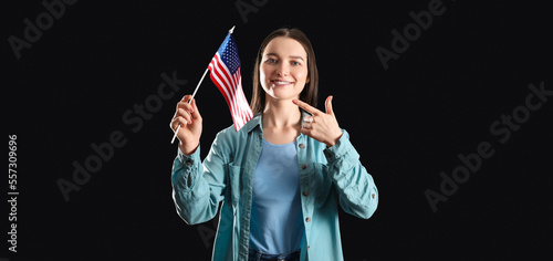 Young woman pointing at USA...