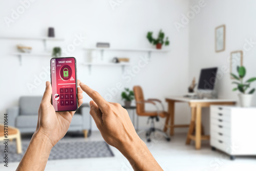 Man's hands holding mobile ...