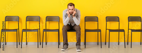 Young man waiting for job i...