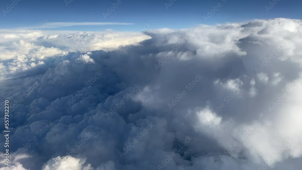 An aerial view of dramatic and moody clouds from above. An aerial view of dramatic and moody clouds from above.