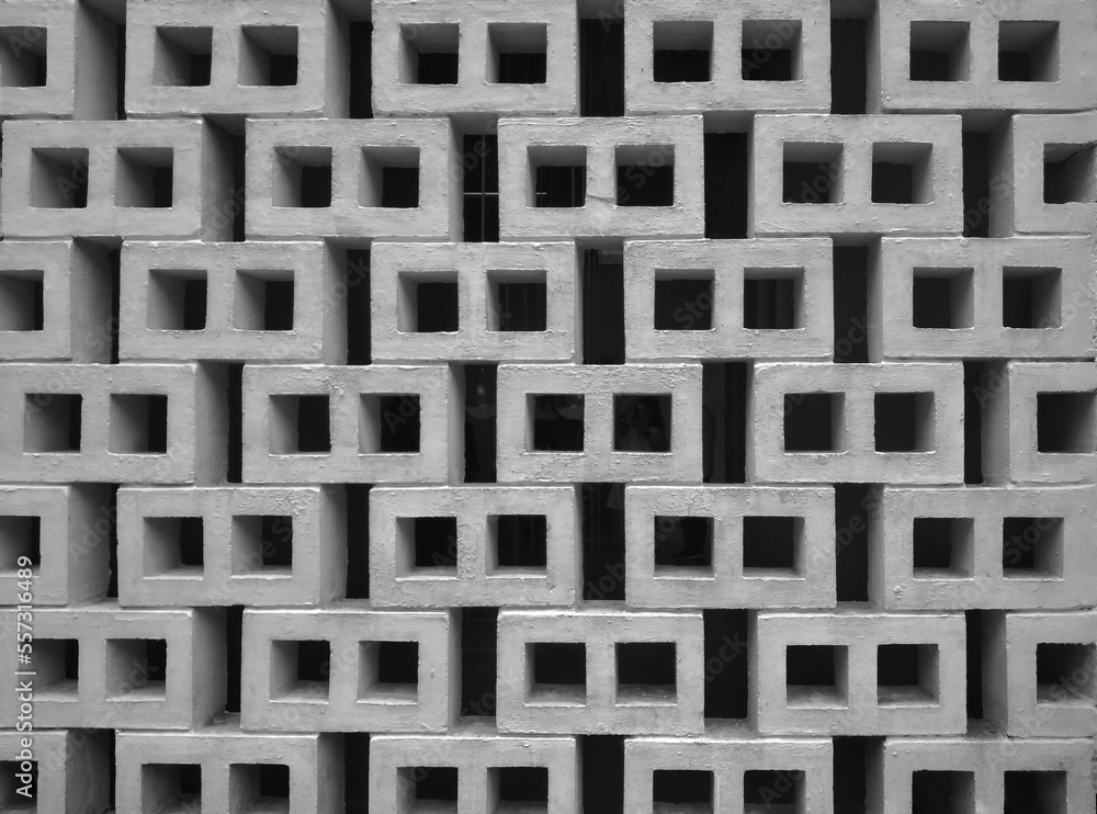 pattern of air ventilation at modern concrete building, light and shadow - monochrome