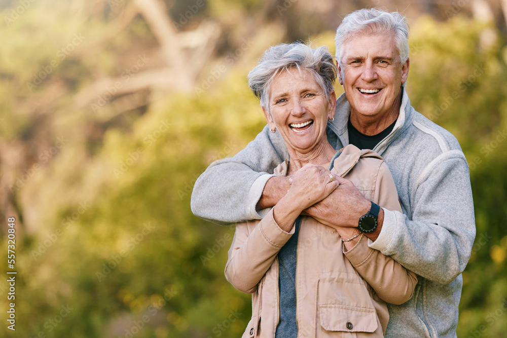 Fototapeta premium Nature, love and portrait of a senior couple hugging in a garden while on romantic outdoor date. Happy, smile and elderly people in retirement embracing in park while on a walk for fresh air together