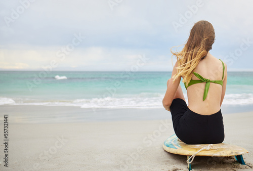 Photography Beach, fitness or woman with surfboard, freedom or calm peace watching the relaxing ocean waves on holiday vacation