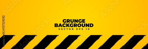 Abstract grunge background vector, warning system banner design, template backdrop with yellow black paint brush texture