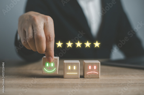 User give rating to service experience on online application for Customer review satisfaction feedback survey concept..