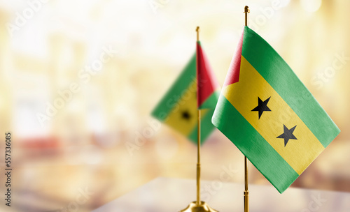 Φωτογραφία Small flags of the Sao Tome and Principe on an abstract blurry background