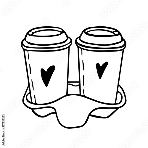Two cups of coffee on a cardboard