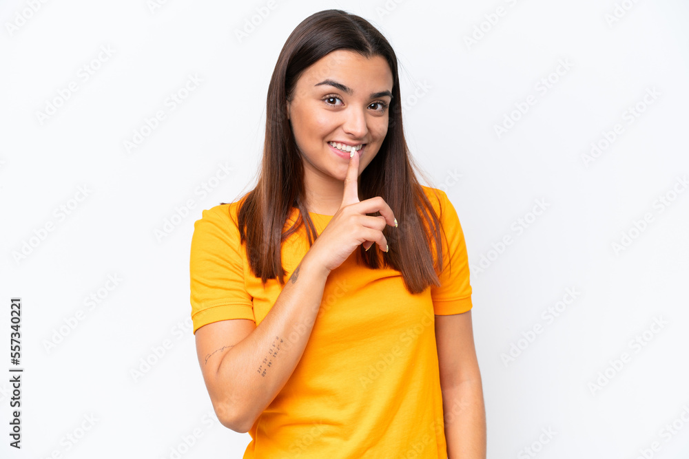 Young caucasian woman isolated on white background showing a sign of silence gesture putting finger in mouth Young caucasian woman isolated on white background showing a sign of silence gesture putting finger in mouth