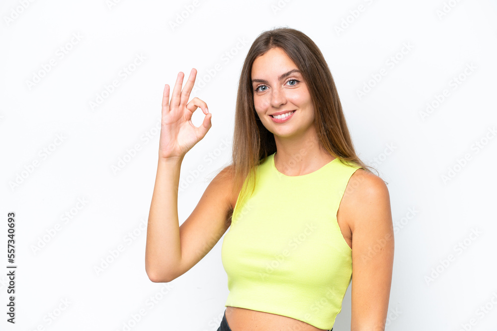 Young caucasian woman isolated on white background showing ok sign with fingers Young caucasian woman isolated on white background showing ok sign with fingers