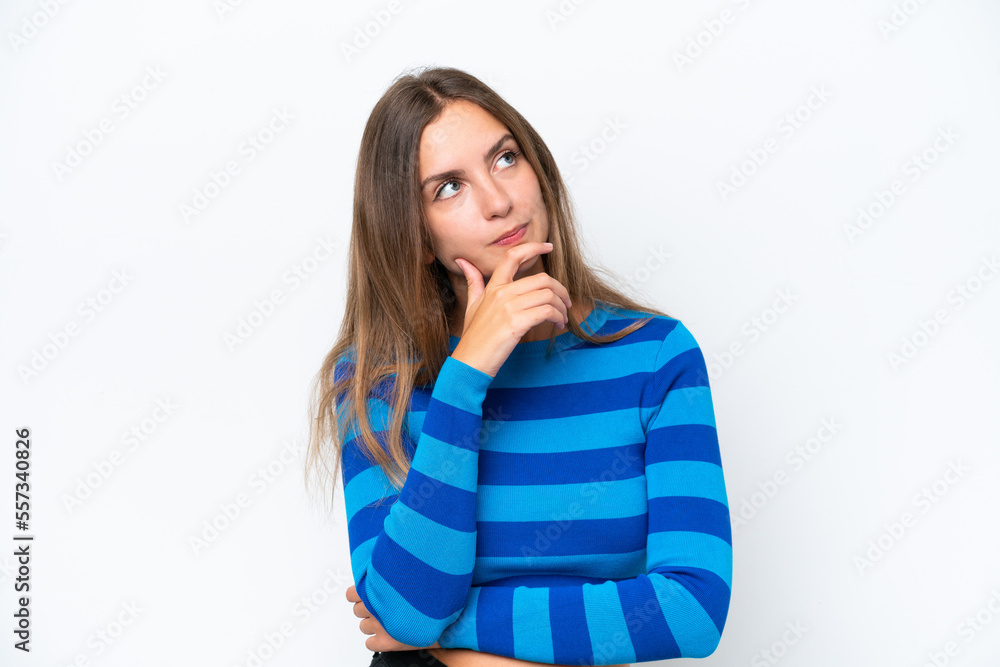 Young caucasian woman isolated on white background and looking up Young caucasian woman isolated on white background and looking up