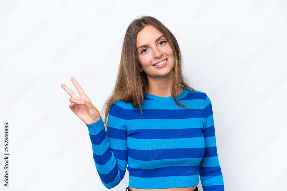 Young caucasian woman isolated on white background smiling and showing victory sign Young caucasian woman isolated on white background smiling and showing victory sign
