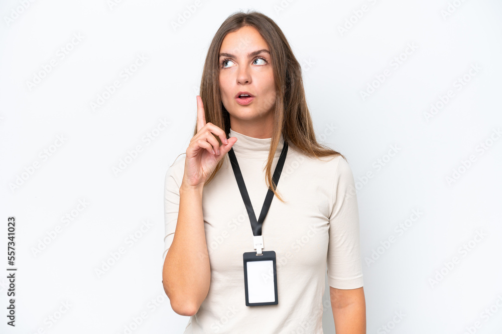 Young pretty woman with ID card isolated on white background thinking an idea pointing the finger up Young pretty woman with ID card isolated on white background thinking an idea pointing the finger up