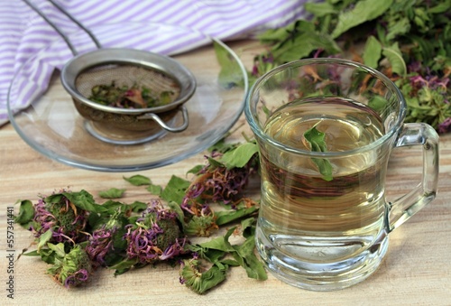 Herbal tea made from dried monarda, lat. Monarda didyma. Fragrant herb is used in tradicional medicine as a medicinal plant from time of Native Americans.  Smelling like bergamot. photo