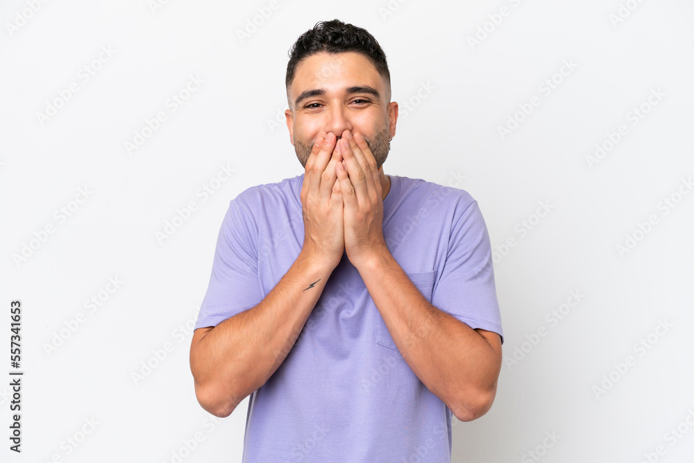 Young Arab handsome man isolated on white background happy and smiling covering mouth with hands Young Arab handsome man isolated on white background happy and smiling covering mouth with hands