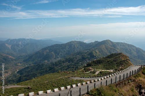 Beautiful road from Kurseong to Darjeeling with layers of mountain in background. photo