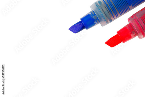 Two chisel shaped markers, a blue chisel marker and a pink chisel marker isolated on a white background with copy space