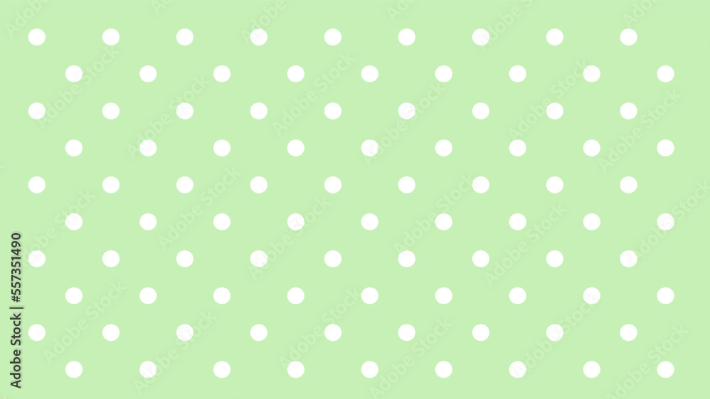 light green background with white polka dots