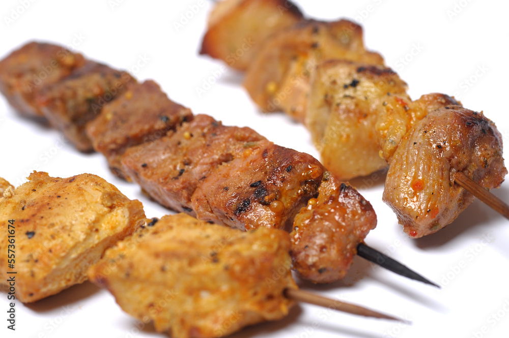 meat skewers isolated on a white background meat skewers isolated on a white background