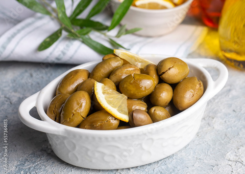 Cracked green olives. Crack...