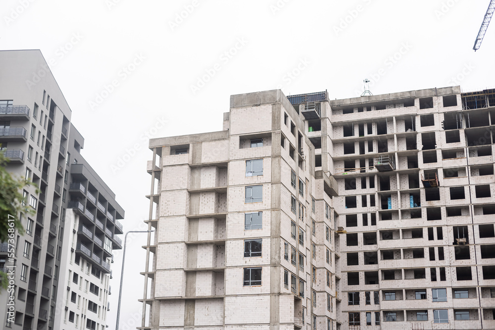 Construction site with crane and building. Construction site with crane and building.