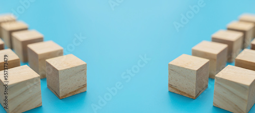 Blue colored square wooden cubes tiles wall texture background. Simple cubic shape assembled