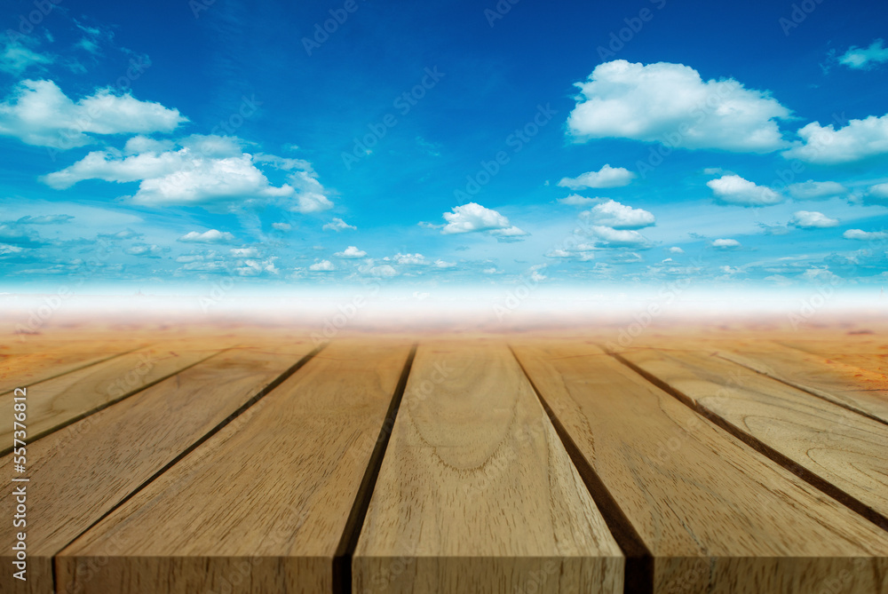 wooden table background of free space. mountains.Spring blue sky with white clouds .Space concept for text and decoration, advertisement. wooden table background of free space. mountains.Spring blue sky with white clouds .Space concept for text and decoration, advertisement.