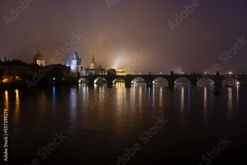 Charles Bridge Prague in foggy night
